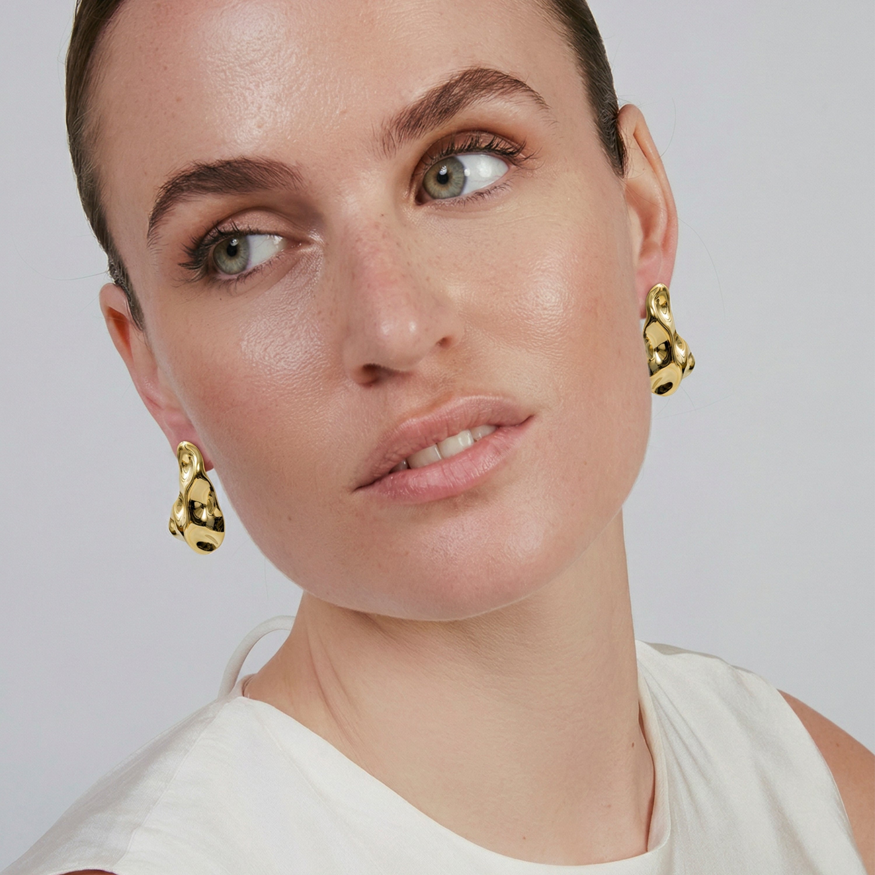 Pendientes acabado en oro amarillo de 18k - Thiya