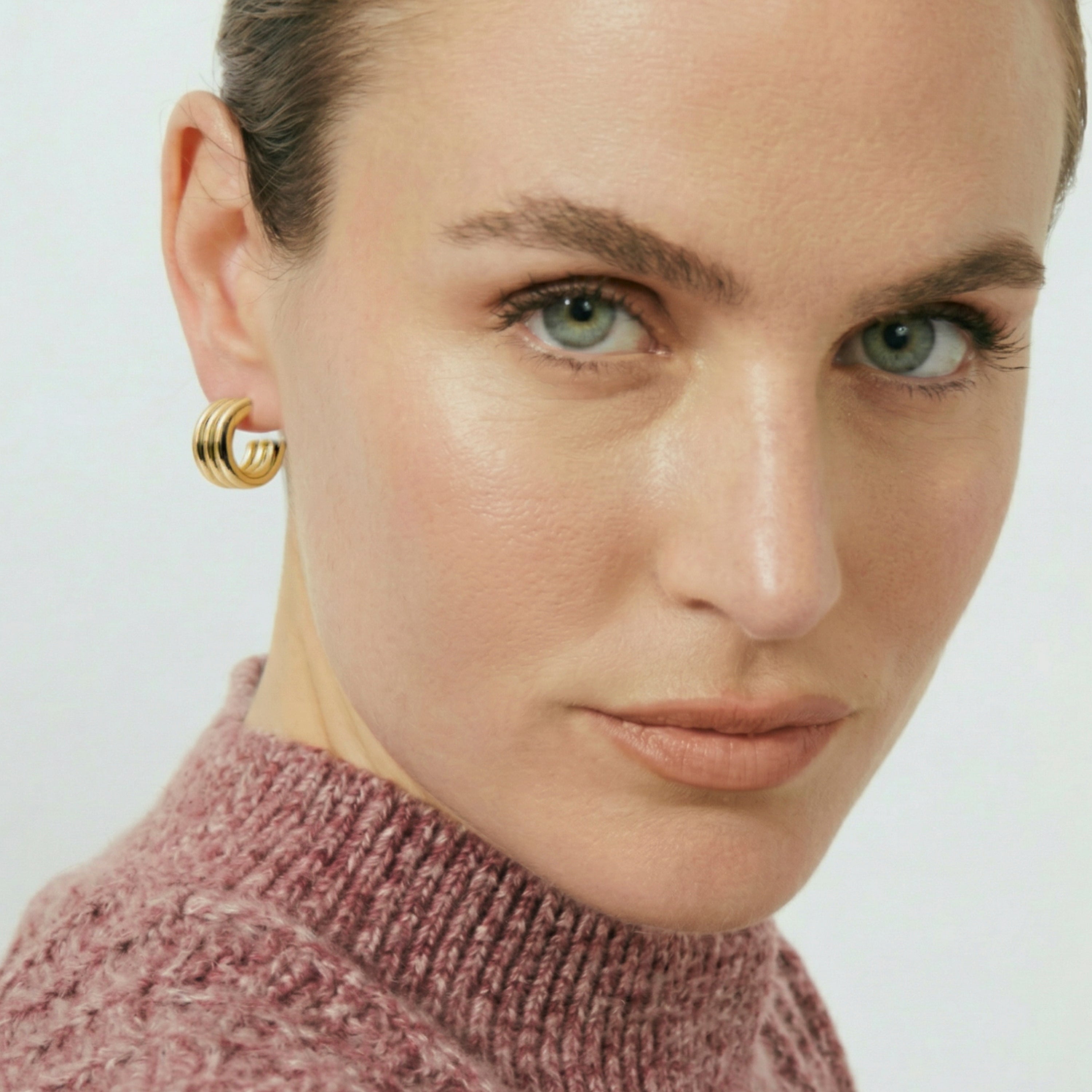 Pendientes Sungi acabado en oro amarillo de 18k