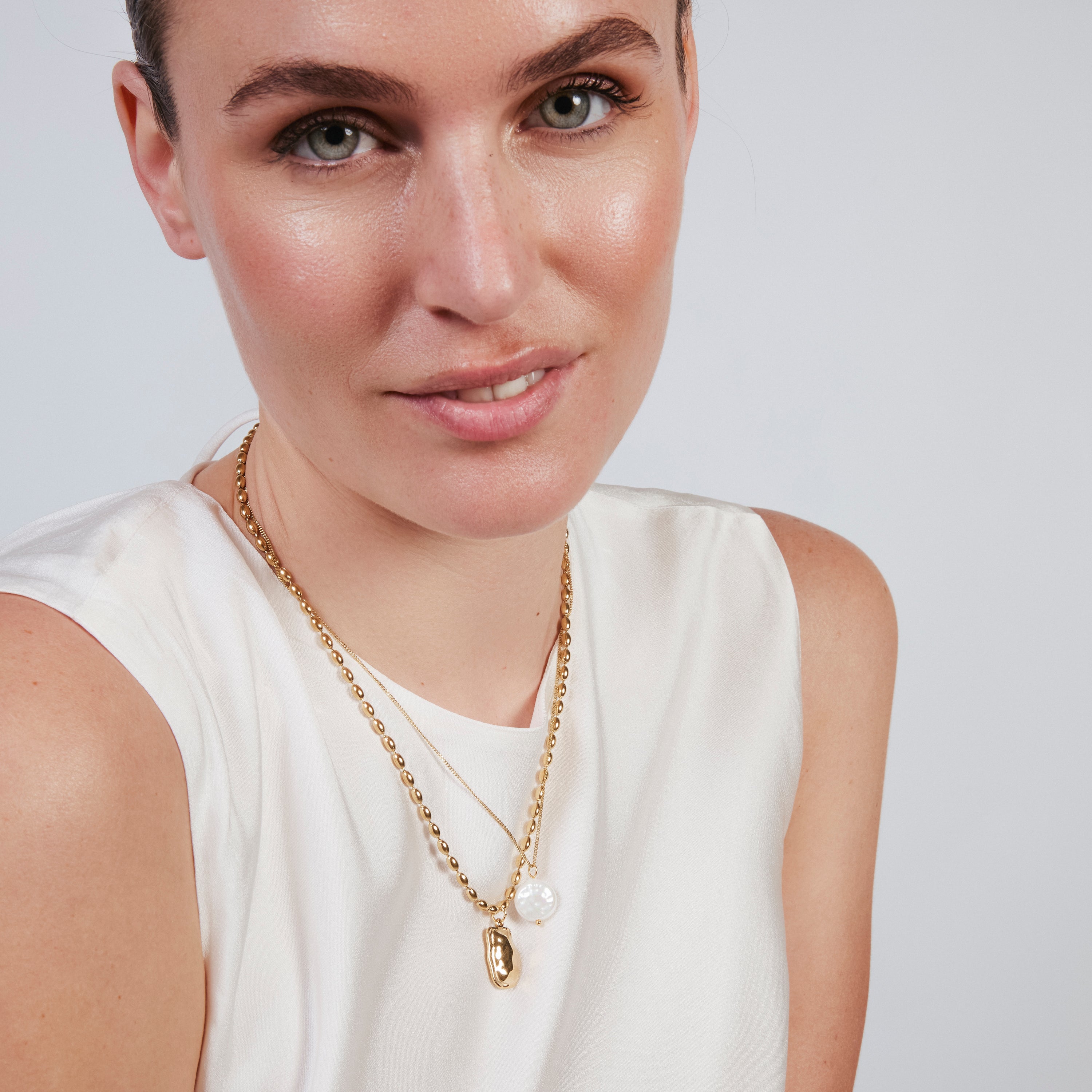 Collar de Perla Blanca acabado en oro amarillo de 18k - Dehan
